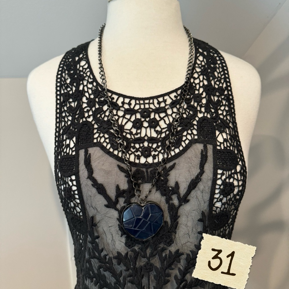 Long blue heart necklace.